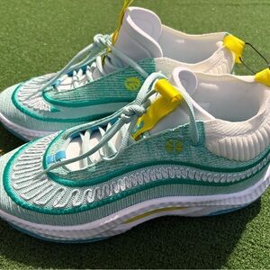 Nike White and Cream Athletic Shoes